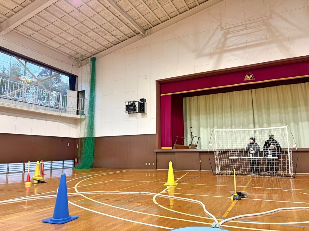 「実技審査」高度3.5m上昇後、ホバリングからスクエア飛行（四角）AからE地点へ速やかな移動を実施